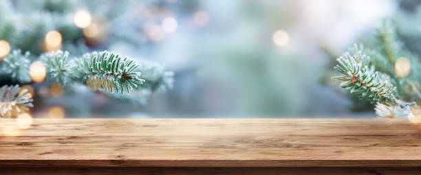 istock Winter garden with wooden table 1194863804