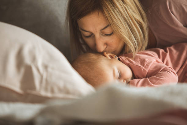 istock Kisses for a baby's good night sleep 1194864053