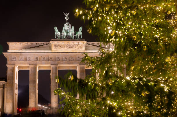 istock Brandenburg Gate and Christmas Tree at night Pariser Platz Mitte Berlin Germany 1194869852