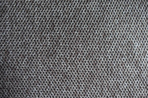 istock Texture of brown woolen fabric with diamond pattern 1194871081