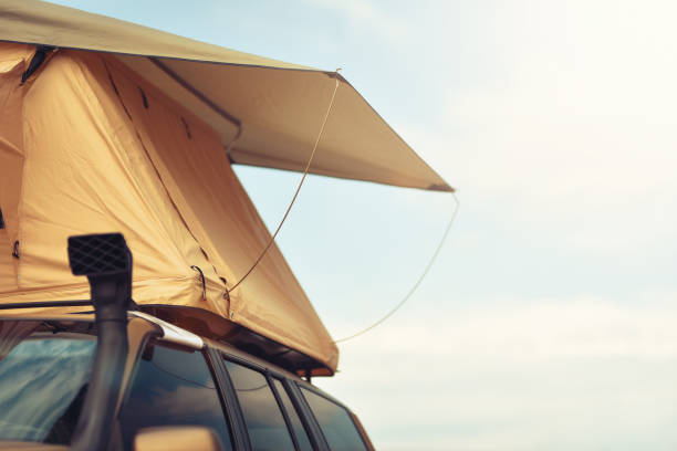istock camping tent traveling by car 1194877701