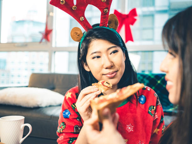 istock Millennial Christmas Pizza party 1194880580
