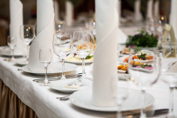 istock Served for banquet restaurant table with dishes, snack, wine glasses 1194880983