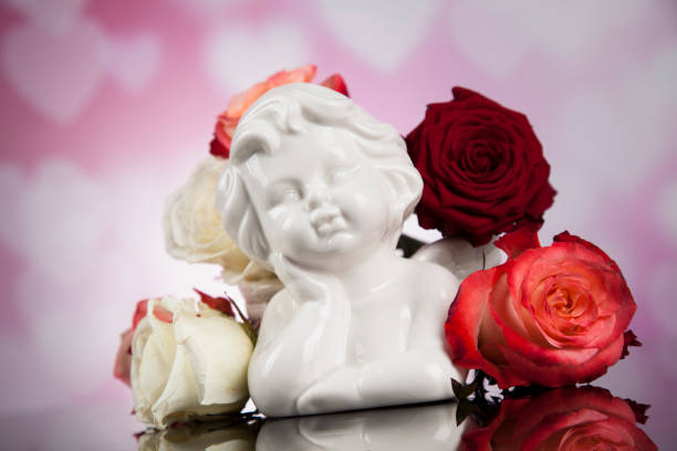 istock Roses, Angels, Valentines day background 1194883868
