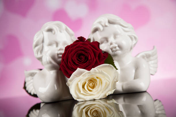 istock Roses, Angels, Valentines day background 1194884623