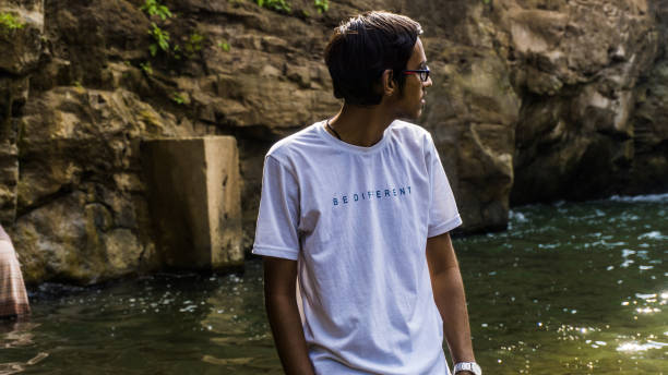 young man Relaxing in nature of Zarwani waterfall, Dhirkhadi