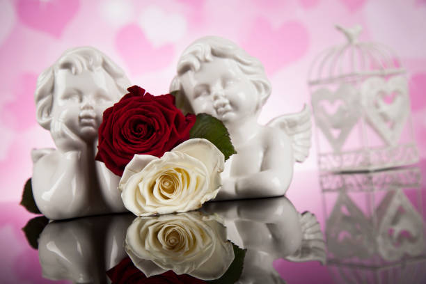istock Roses, Angels, Valentines day background 1194885161