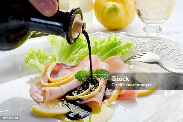 Balsamic Vinegar Over Swordfish Carpaccio Stock Photo - Download Image Now - Balsamic Vinegar, Vinegar, Lettuce
