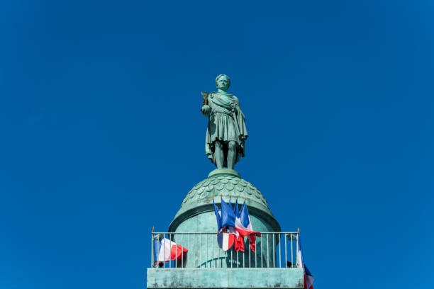 istock Statue on the top of Vendome column, which is started in 1806 at Napoleon's direction and completed in 1810 in Paris, France 1194890257