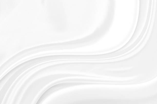 istock White gray satin texture that is white silver fabric silk background with beautiful soft blur pattern natural. 1194890516