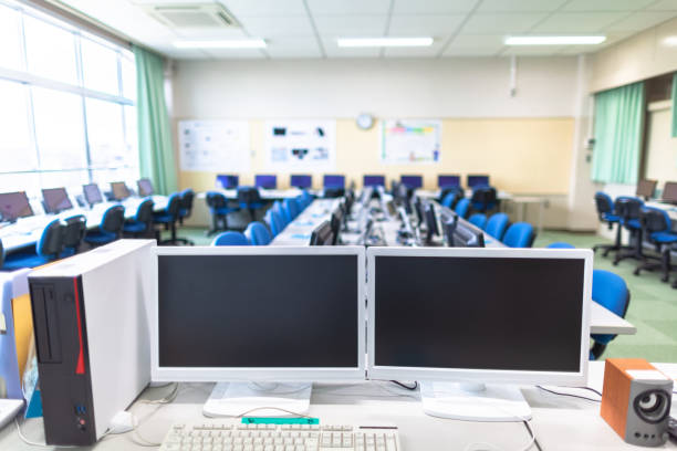 Empty computer lab at school An empty computer lab at school. computer store stock pictures, royalty-free photos & images