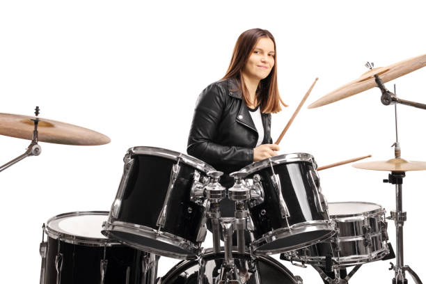 istock Young female musician playing a drum set 1194891986