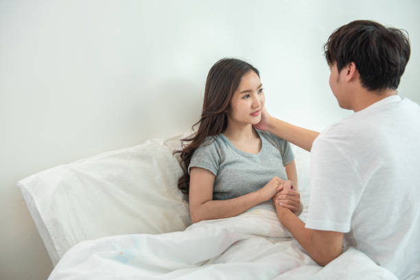 https://media.istockphoto.com/id/1194891994/photo/happy-young-asian-couple-encourage-and-hugging-on-bed-together-happy-and-smiling-expected-mom.jpg?s=612x612&w=0&k=20&c=SA2RtEl8xyWUjn_G4EX9GOpo0uqYPq1yDZlurz3OiZw=