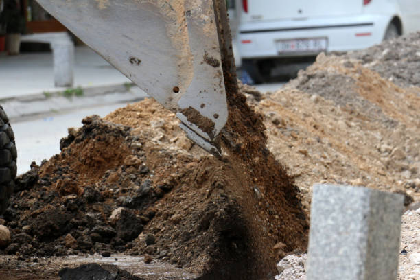 istock repairing street road, municipal work ,construction site, 1194894596