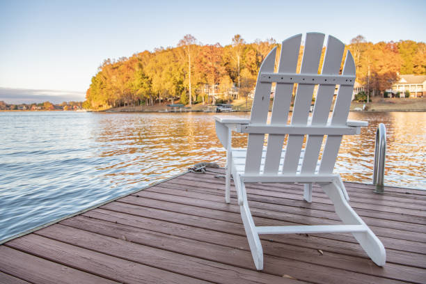 istock Adirondack style chair on a dock, 1194896879