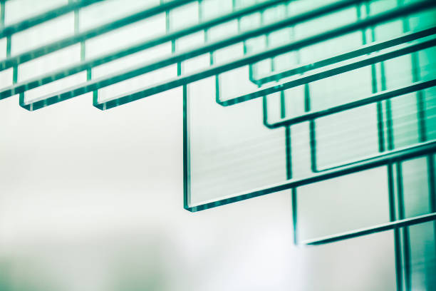 Various types of glass panels stacked on shelves
