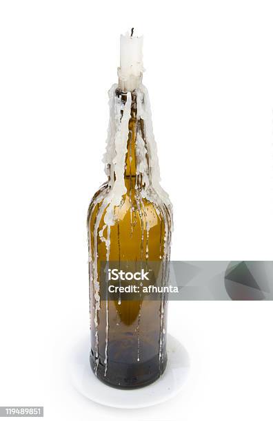The Candle Stuck In A Bottle Stock Photo - Download Image Now - Beeswax, Bottle, Candle