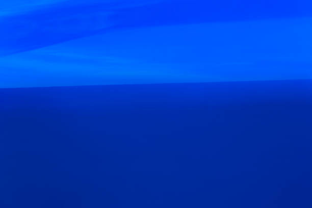 istock Detail on the side a modern compact hatchback car in bright blue 1194899135