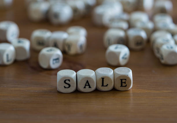 istock Sale written with wooden cubes 1194899615