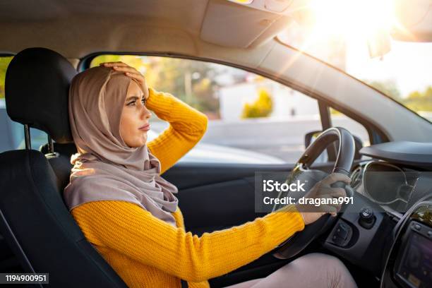 Muslim Woman Is Driving Her Car Very Aggressive Stock Photo - Download Image Now - Driving, Distraught, One Woman Only