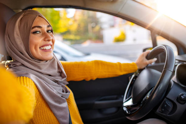 istock Smiling young Muslim woman taking selfie 1194900986
