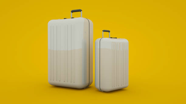 istock Two white travel suitcases isolated on yellow background, 3d rendering 1194901252