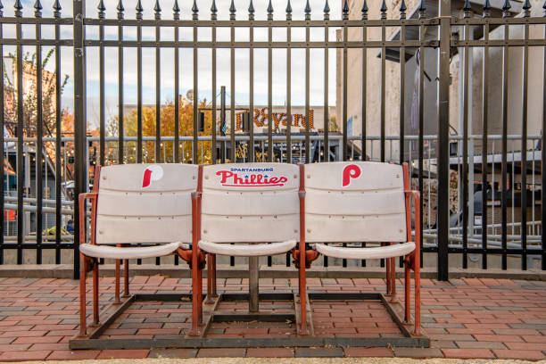Chairs from the Spartanburg Phillies baseball team Spartanburg, S.C. / USA - November 16, 2019: Historical chairs from the Spartanburg Phillies baseball team, on display downtown. baseball stadium chairs stock pictures, royalty-free photos & images