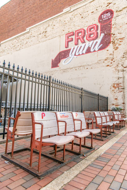 Historical chairs from the Spartanburg Phillies baseball team Spartanburg Spartanburg, S.C. / USA - November 16, 2019: Historical chairs from the Spartanburg Phillies baseball team, on display downtown. baseball stadium chairs stock pictures, royalty-free photos & images