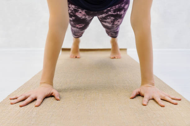 istock Part of girl exercise plank. 1194903031