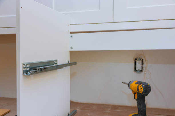 istock Hinge drawers assembly on assembling furniture closets cabinets screwdriver and mounting 1194906157
