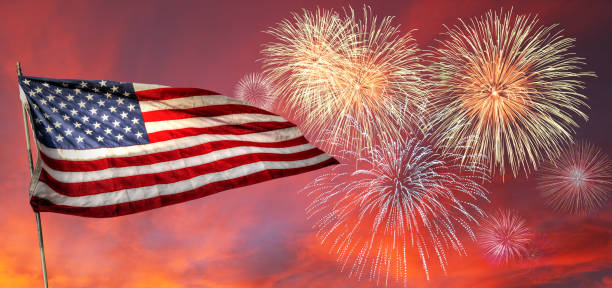 istock USA Flag With Fireworks Celebration 1194907057