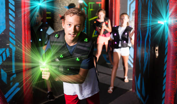 istock Boy having fun on lasertag arena 1194907379