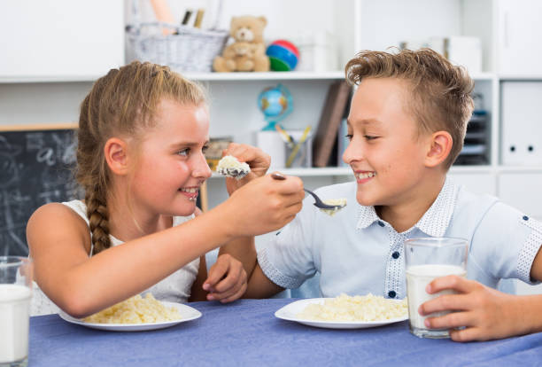 istock Friends are feed each other during dinner 1194908198
