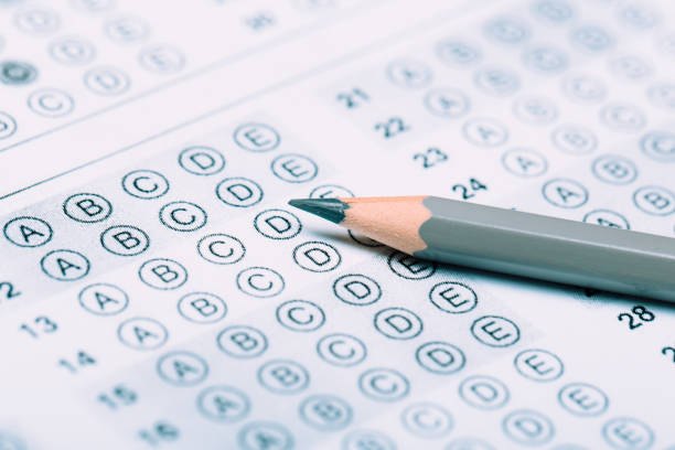 istock Fill in the answer sheet in the exam with a pencil 1194908288