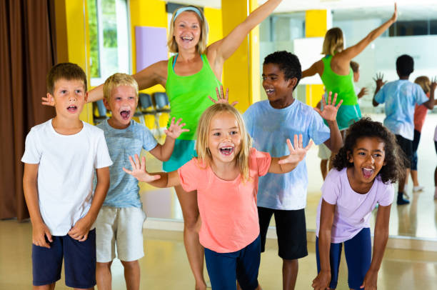 istock Happy children in dance studio smiling and having fun 1194908577