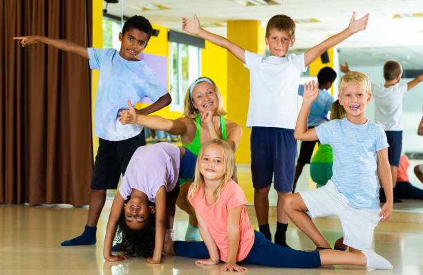 istock Happy children in dance studio smiling and having fun 1194908578