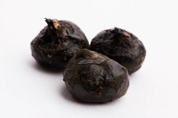istock Chinese water chestnut on white 1194910958