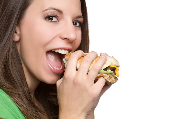 istock Woman Eating Burger 119491108