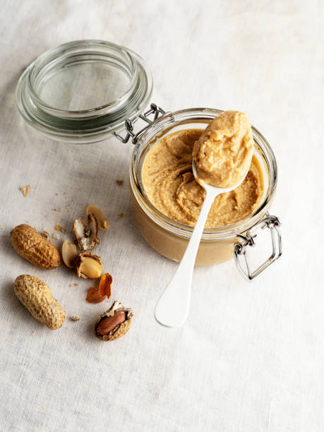 istock peanut butter,peanut,Jar of peanut butter 1194911100