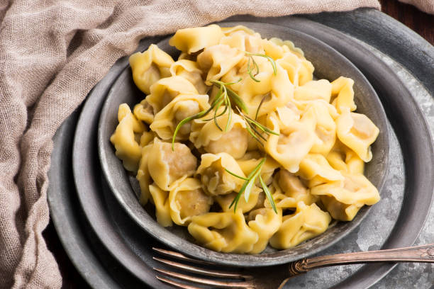 istock Meat Dumplings - russian boiled pelmeni in plate 1194911171