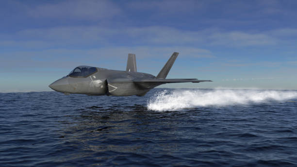 istock F-35 jet fighter low flying over sea 3d render 1194913669