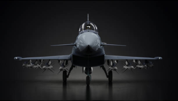 istock Eurofighter typhoon airplane fighter jet fully loaded  in dark background front view 3d render 1194913673
