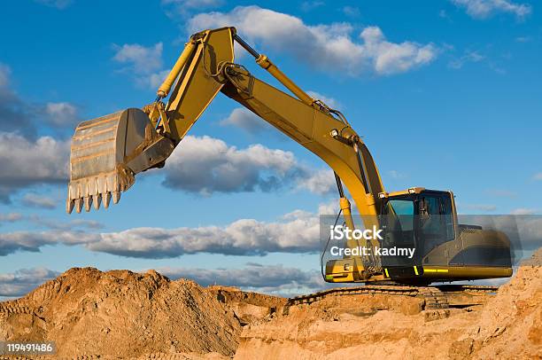 Tracktype Loader Excavator At Sand Quarry Stock Photo - Download Image Now - Backhoe, Dirt, Motion