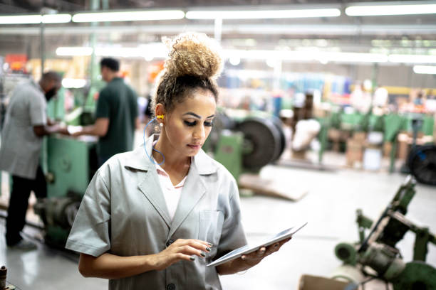 istock Woman using digital tablet in the industry 1194915569