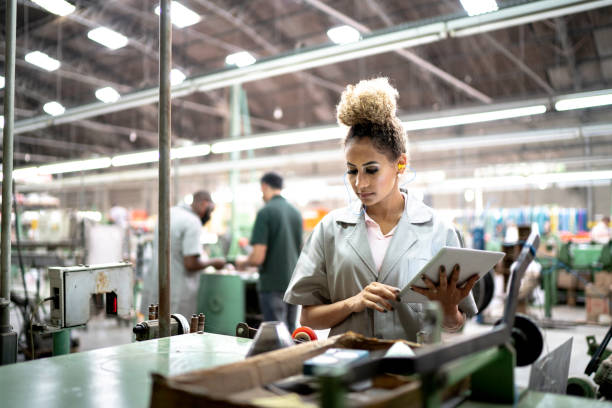 istock Woman using digital tablet in the industry 1194915570