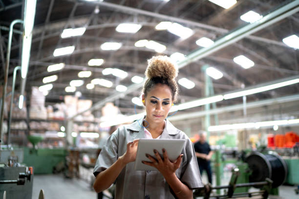 istock Woman using digital tablet in the industry 1194915571