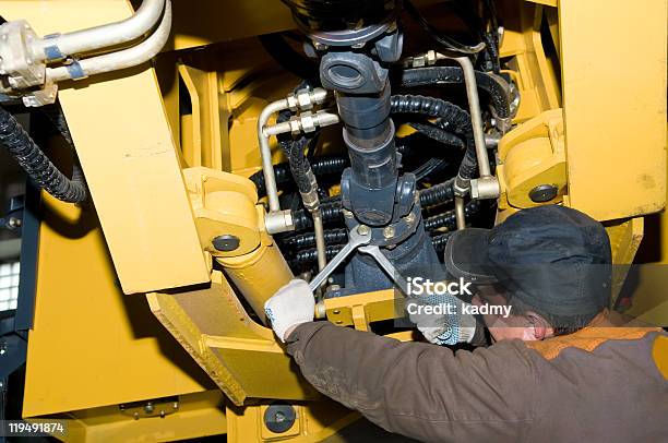 Maintenance Work Of Heavy Loader Stock Photo - Download Image Now - Repairing, Construction Machinery, Machinery
