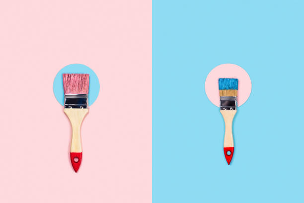 istock Two-toned background with paint brushes and circles. 1194920477