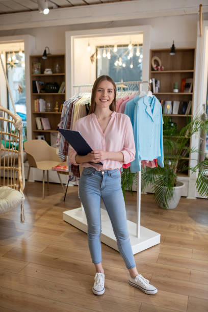 istock Young girl designer makes a presentation of her work. 1194922890