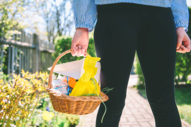 istock little girl looking for hidden easter eggs 1194923166